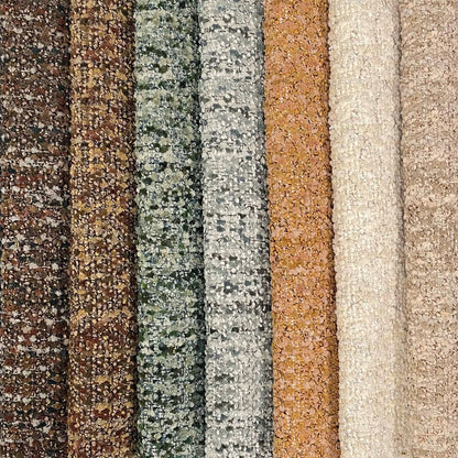 Collection of different textured fabric samples in various colors.