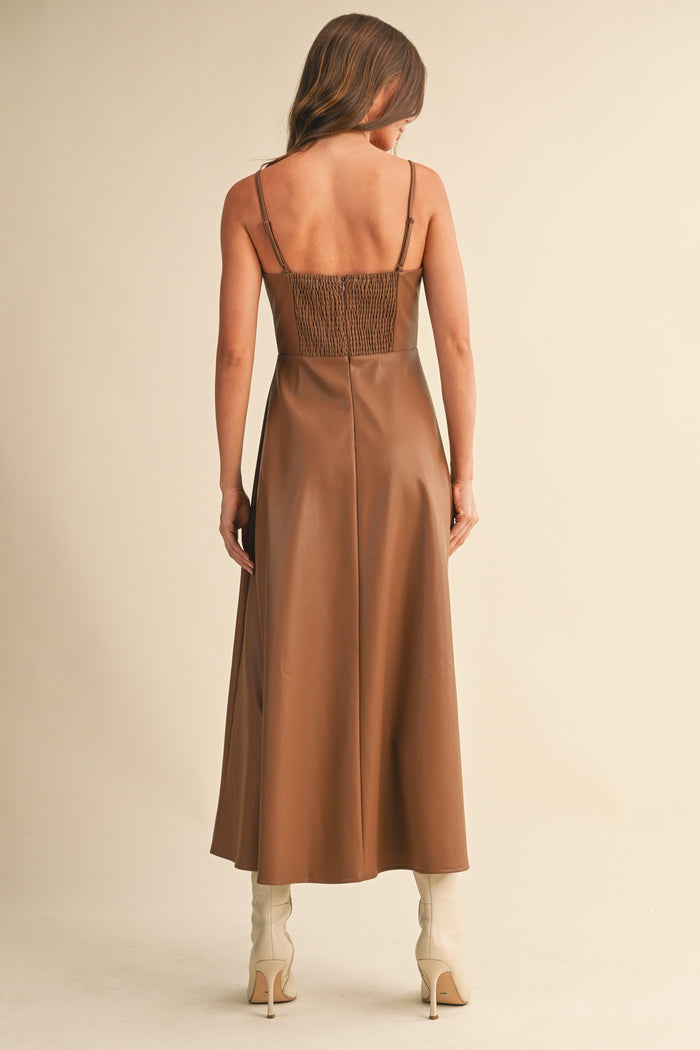 Back view of brown Faux Leather Corset Midi Dress showing smocked detail and A-line