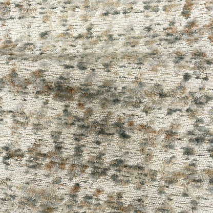 Textured stone surface with a mix of gray, brown, and black colors.