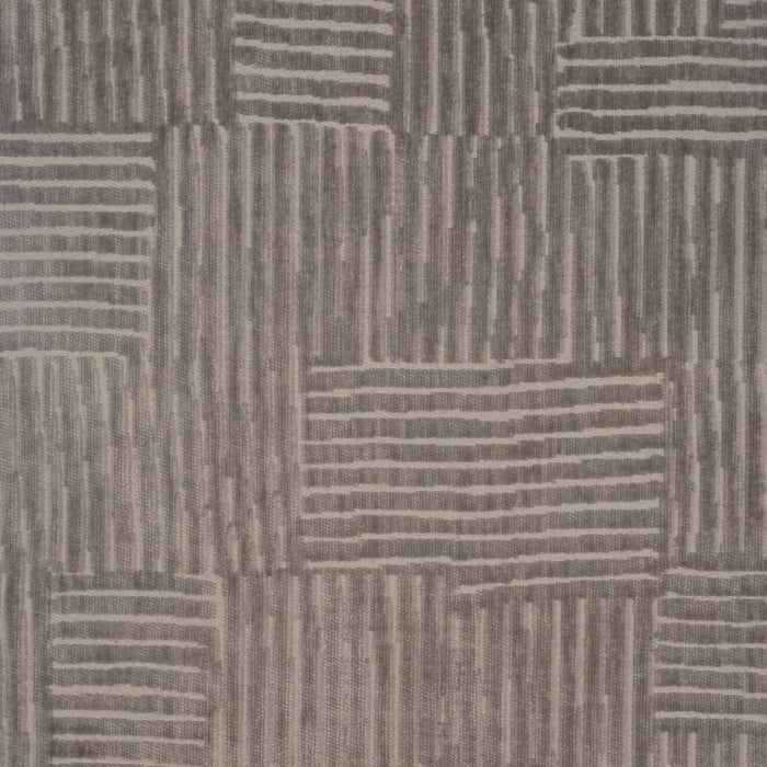 Textured patterned fabric with wavy lines in shades of brown.