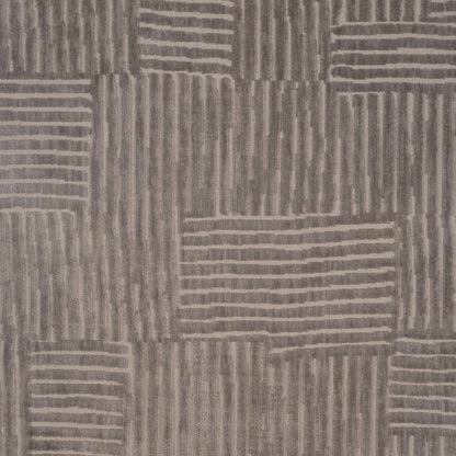Textured patterned fabric with wavy lines in shades of brown.