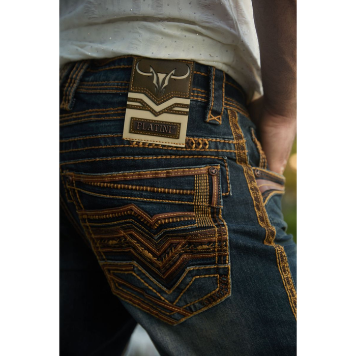 Close-up of back pocket design on Platini Holt Men’s Dark Stone Slim Boot Cut Jeans with heavy tan stitching.