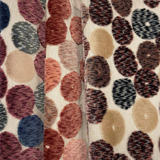 Patterned fabric with multicolored circles on a white background
